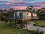 Australian House Design Group GF2009 granny flat with modern exterior and large windows, showcasing contemporary residential architecture.