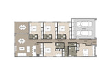 Interior view of a modern rooming accommodation by Australian House Design Group, featuring contemporary furnishings and decor.