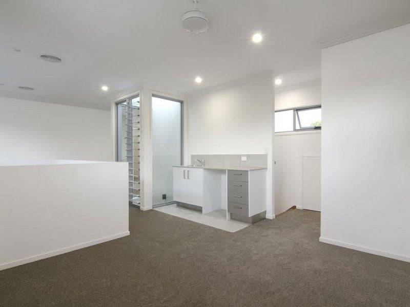Australian House Design Group D3002 duplex home exterior with modern architecture and neutral color scheme.
